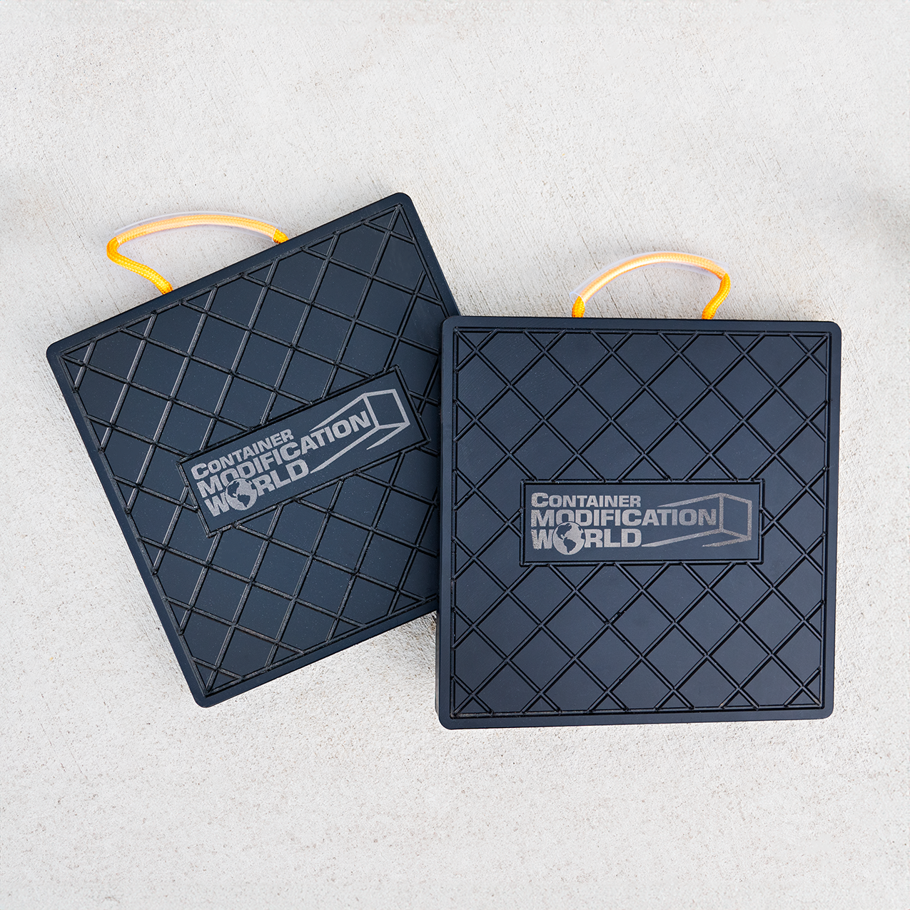 Durable high-density container corner pad with handle for easy maneuvering