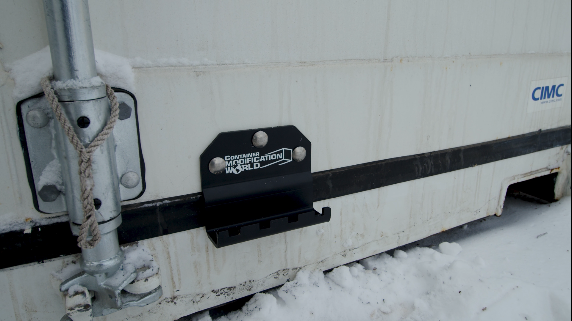 Kick 'N' close kick plate installed to protect door seals
