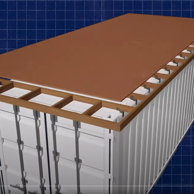 Wood truss brackets installed on a shipping container, supporting a wood roof frame without penetrating the container interior